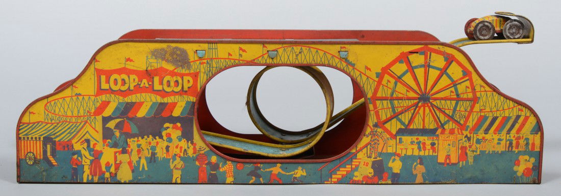 "Loop-A-Loop" Lithographed Sheet Steel Roler Coast: "Loop-A-Loop" Lithographed Sheet Steel Roler Coaster Toy, spring driven track with car, marked: "Wolverine Suppy and Mfg. Co.", 19"l. Condition: light paint loss.