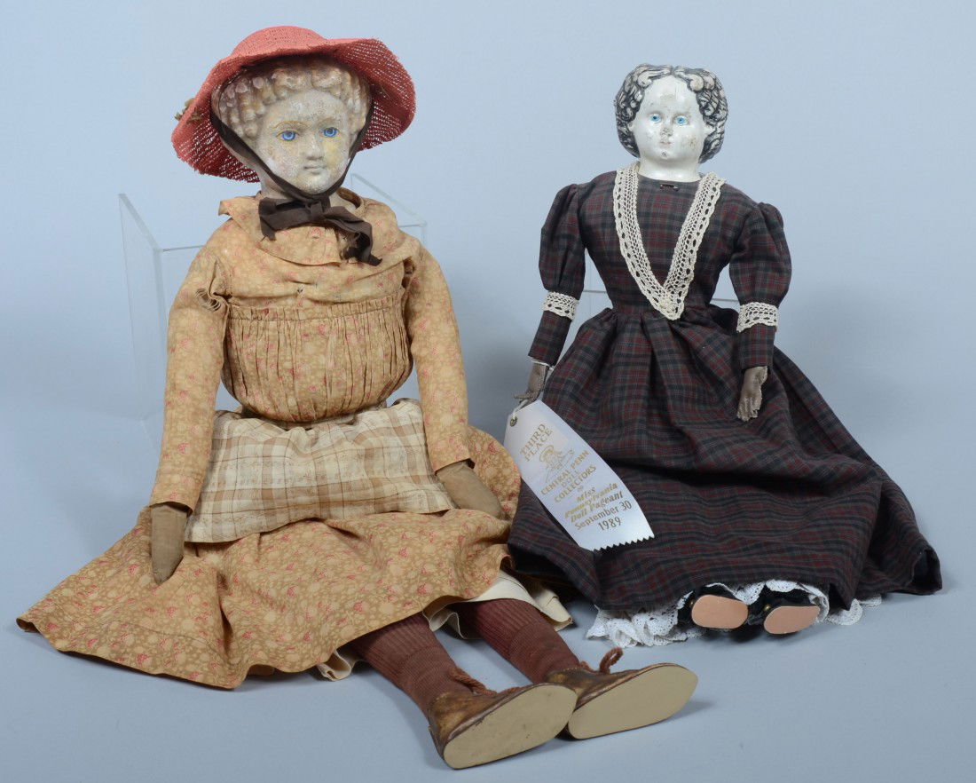 Two 19th Century Composition Head Dolls, dark hair: Two 19th Century Composition Head Dolls, dark haired with leather covered hands. Label on back: "Greiner's Patent Heads, No. 6. Pat. March 30,'59 (1859). 23"h.; blonde hair doll with cloth body. Unmar