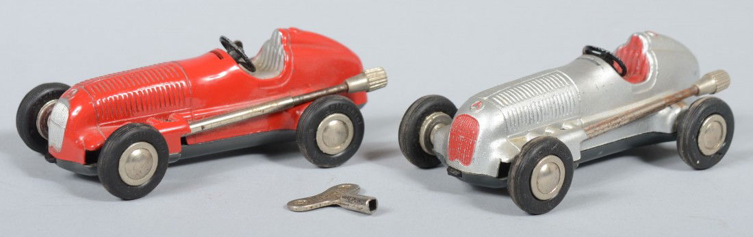 Pair of Schuco Micro Racers. Marked: Mercedes, Mod: Pair of Schuco Micro Racers. Marked: Mercedes, Modell 1935, made in Western Germany, on bottoms. Each 4"l. and with one key. Condition: Good, with use wear.