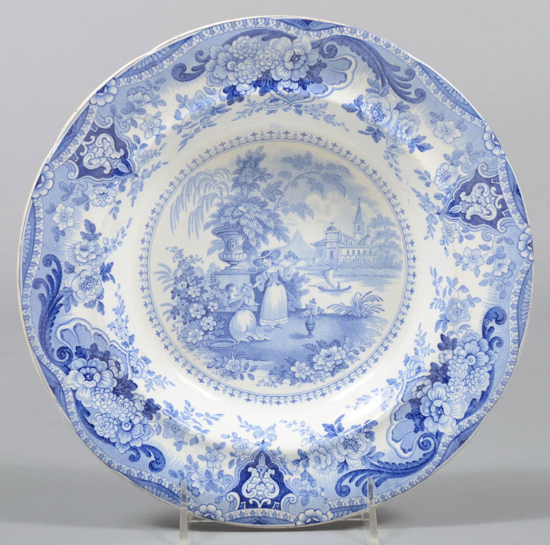 Blue Staffordshire Soup Plate, girls gathering flo: Blue Staffordshire Soup Plate, girls gathering flowers, lake and church with floral border. Marked: "Italian Buildings, R. Hall" verso. Condition: Good