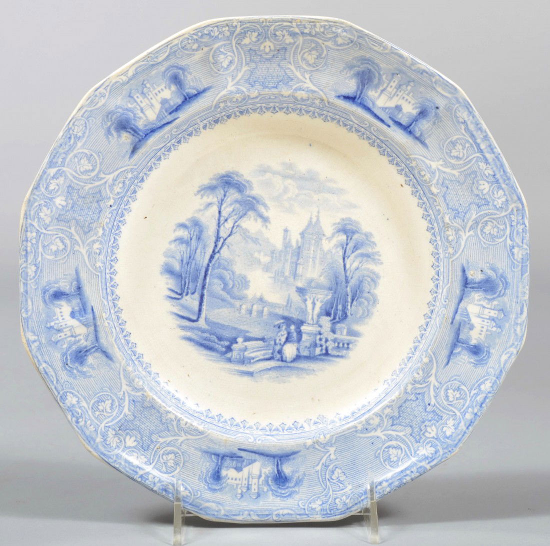 Blue Staffordshire Ironstone Plate, castle on wate: Blue Staffordshire Ironstone Plate, castle on water with classic garden, castle vignettes on border with 12 sided rim. Marked: "Lozere, E. Challinor", verso. 9 1/2"dia. Condition: Good