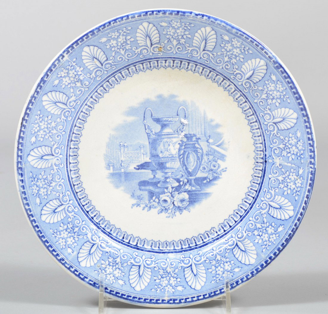 Blue Ironstone Transfer Plate, classical scene wit: Blue Ironstone Transfer Plate, classical scene with urns and Greek shield border. Unmarked. 8 3/4" dia. Condition: Good