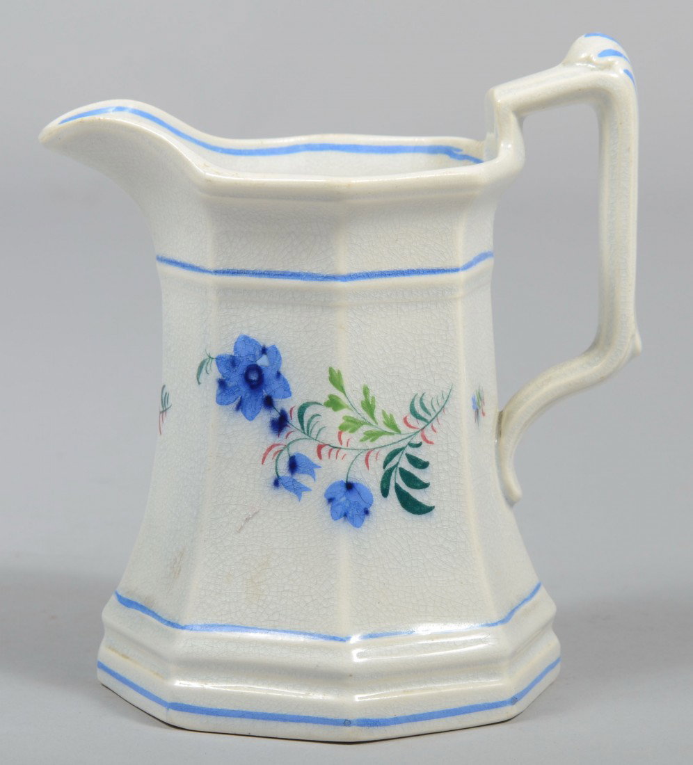 Ironstone Pitcher, octagonal body, blue floral spr: Ironstone Pitcher, octagonal body, blue floral spray, probably English. Unmarked. 5 1/2"h. Condition: Good