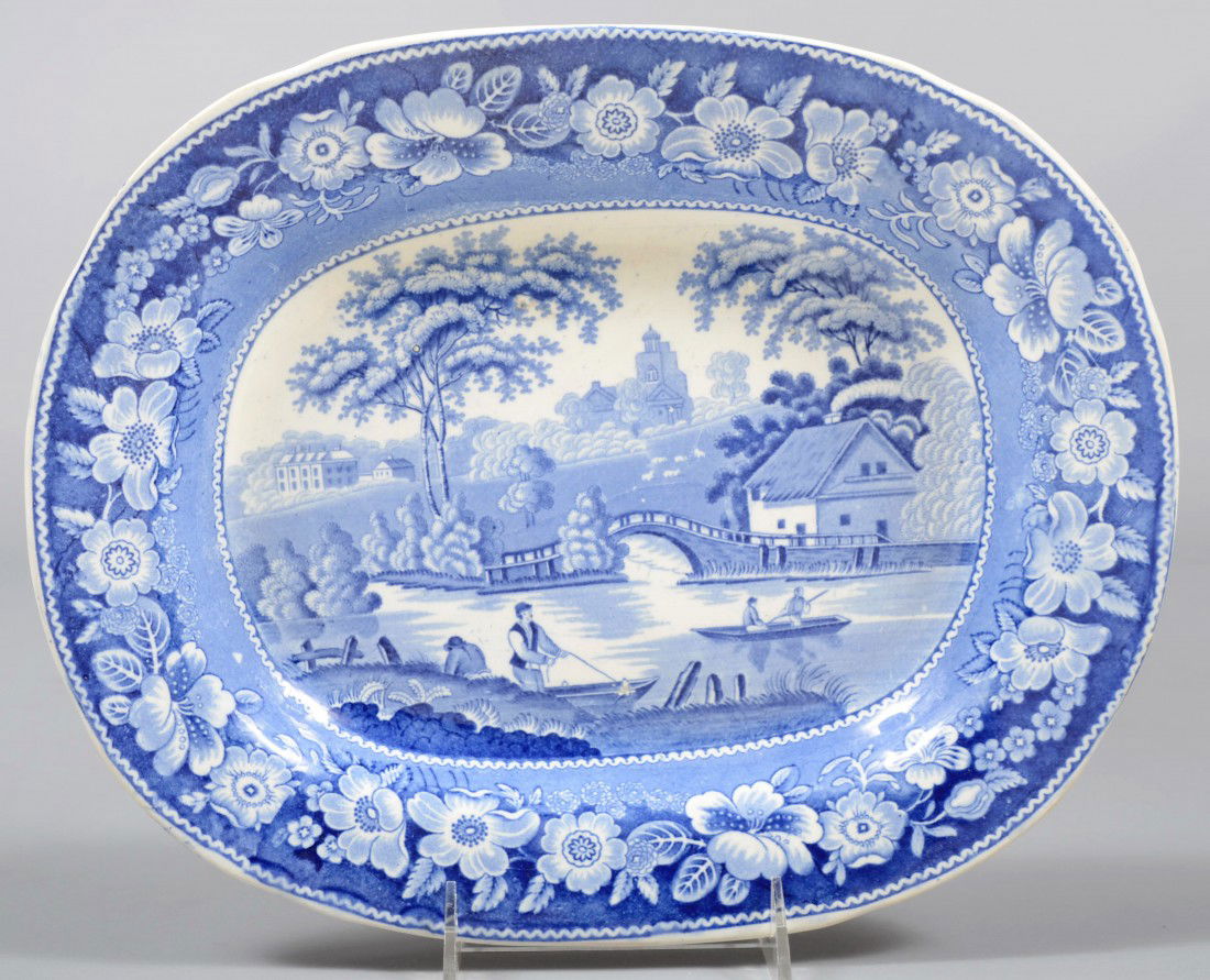 Blue Transfer Staffordshire Platter, pastoral wate: Blue Transfer Staffordshire Platter, pastoral water scene, wild rose border. Unmarked. 12 1/2"l. X 10 1/4"w. Condition: Good