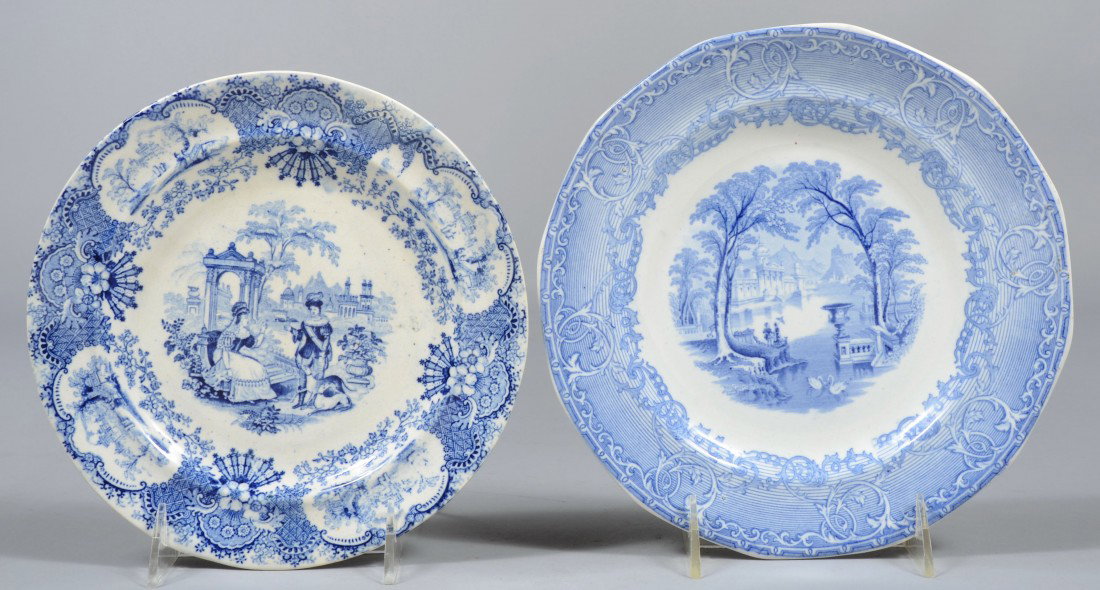 Two Blue Transfer Ironstone Plates, one a Spanish : Two Blue Transfer Ironstone Plates, one a Spanish court scene with patterned border, unmarked; along with a similar example marked: "Pearl Stone Ware, Venus, P. W. & Co." 8" & 8 1/2"dia. Condition: bo