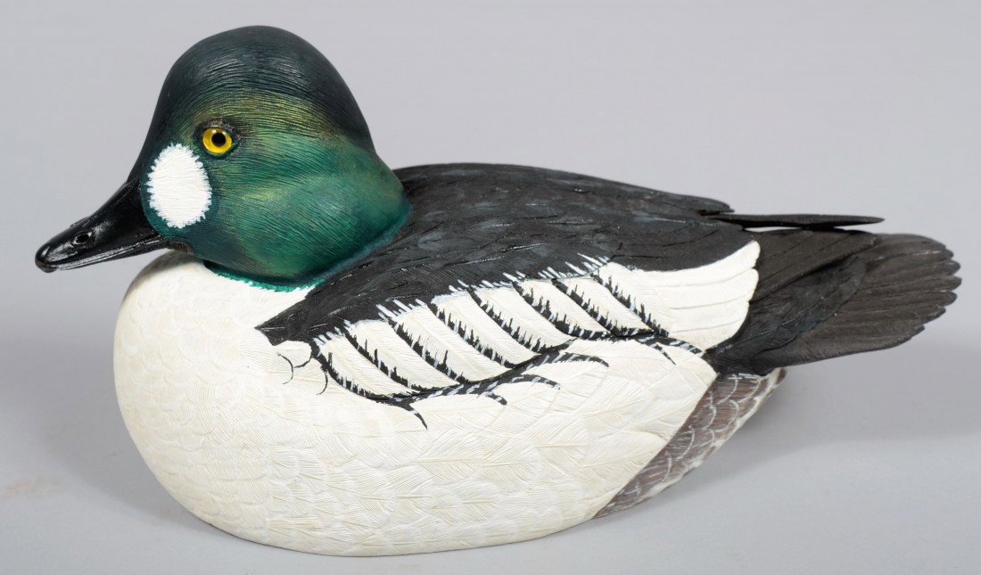 Robert D. Staller signed, Realistic Carved and Pai: Robert D. Staller signed, Realistic Carved and Painted Floating Goldeneye Drake. This example is accompanied by a 3rd Place ribbon from 1999 Ward Wildfowl Carving Competition at Ocean City, MD. Legend