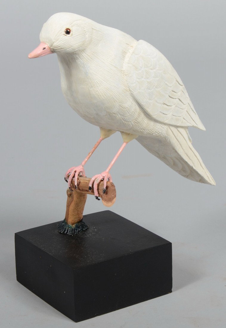 Robert D. Staller signed, Realistic Carved and Pai: Robert D. Staller signed, Realistic Carved and Painted Turtle Dove. Carving mounted on a tree branch attached to a black wood block which bears the artist's signature, date,2001, and title, "Peace". B