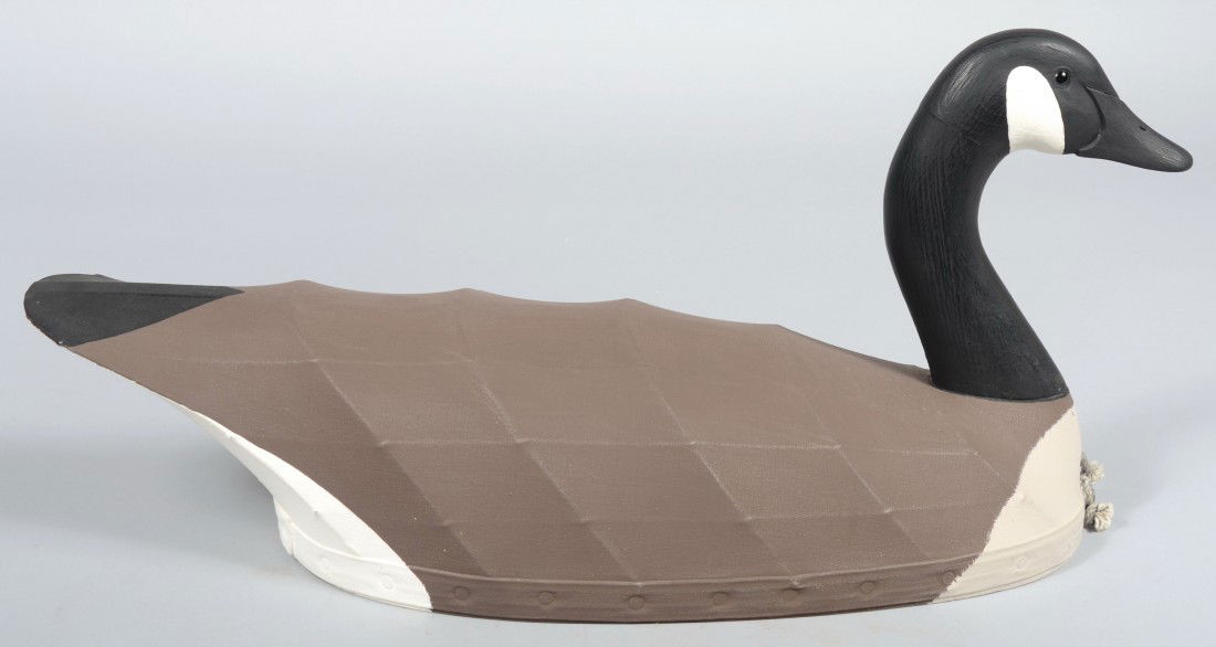 Nick Sapone signed, Ribbed Canvas Covered and Pain: Nick Sapone signed, Ribbed Canvas Covered and Painted Canada Goose with realistic carved head. Inscribed in pen on bottom "Nick Sapone, Wanchese, N.C." along with an impressed N S. 24"l. Condition: Go