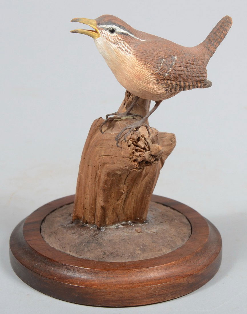 Earl Wagner signed, Realistic Carved and Painted C: Earl Wagner signed, Realistic Carved and Painted Carolina Wren. Perched on a branch stub mounted on a walnut colored circular base. Bottom of base shows legend: "Carved by Earl Wagner, Glenarm, MD. 10