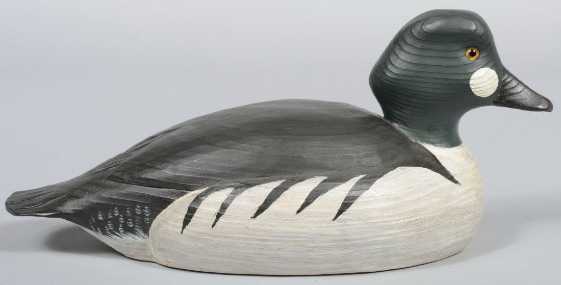 Russell Fish signed, Carved and Painted Common Flo: Russell Fish signed, Carved and Painted Common Floating Goldeneye Drake. Signed on bottom: "Russell Fish, Chincoteague Island, VA., 1991" in ball-point and stamped "FISH" near the edge. 15 1/2"l. Cond