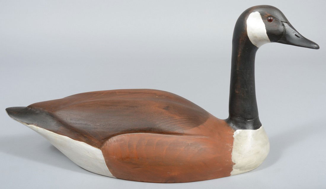 John J. Laity Carved and R. D. Staller Painted Flo: John J. Laity Carved and R. D. Staller Painted Floating Canada Goose. Marked as above and dated 1984. 23"l. Condition: Good.