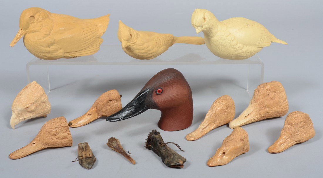 Bird Modeler's Group of Resin Bird Models. Example: Bird Modeler's Group of Resin Bird Models. Examples include: Cardinal, Woodcock, Partridge, Hawks head, and several duck heads. Also a painted cast iron Canvasback head and three real duck bills. Resi