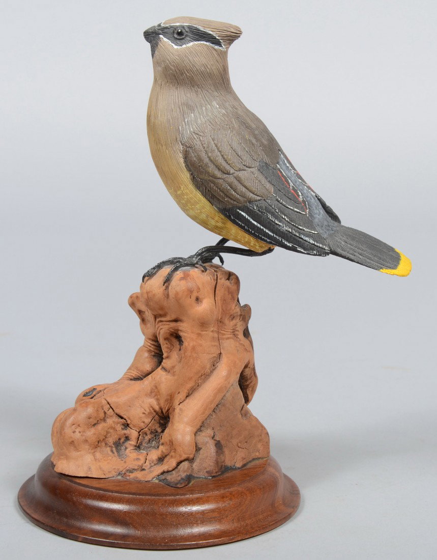Robert D. Staller signed, Realistic Carved and Pai: Robert D. Staller signed, Realistic Carved and Painted Cedar Waxwing. Mounted on a piece of burl wood on a molded circular walnut base with signature and date, 4/'86, on the bottom. 8 3/4"h. overall. 