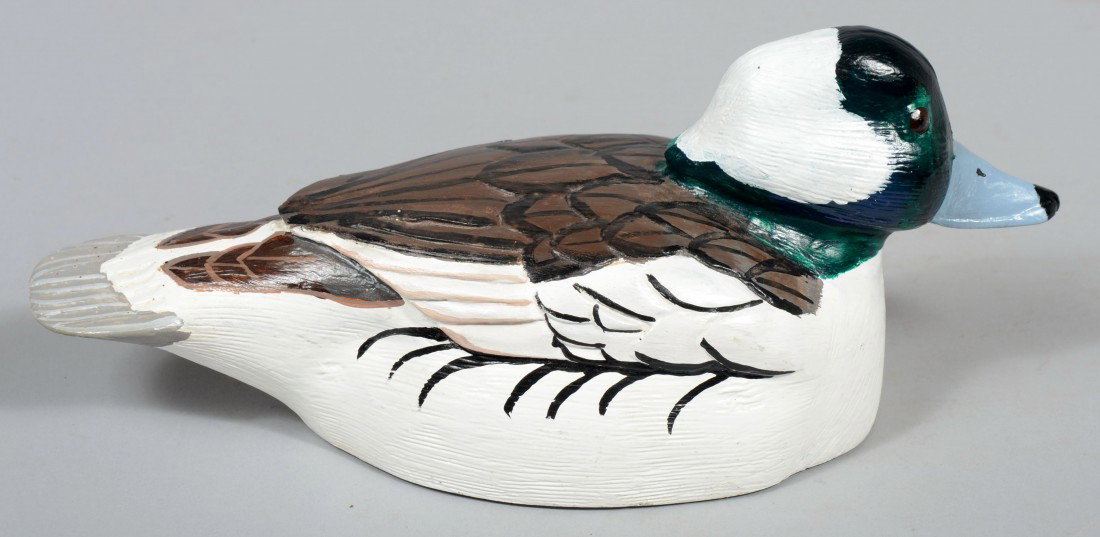 Cast Aluminum Bufflehead Doorstop. Manufactured by: Cast Aluminum Bufflehead Doorstop. Manufactured by Warwick Aluminum Foundry and painted by Bob Staller all marked on the bottom. 11"l. Condition: Heavy