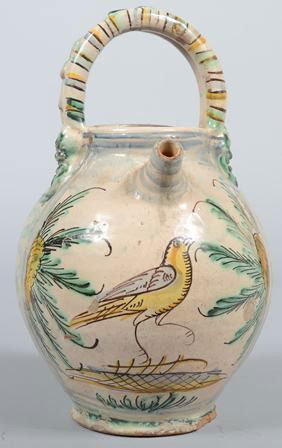 Polychrome Earthenware Open Jug with applied 'bask: Polychrome Earthenware Open Jug with applied 'basket' handle. A light redware with white glaze inside and out and decorations including a yellow bird on front with floral details. Style is probably Co
