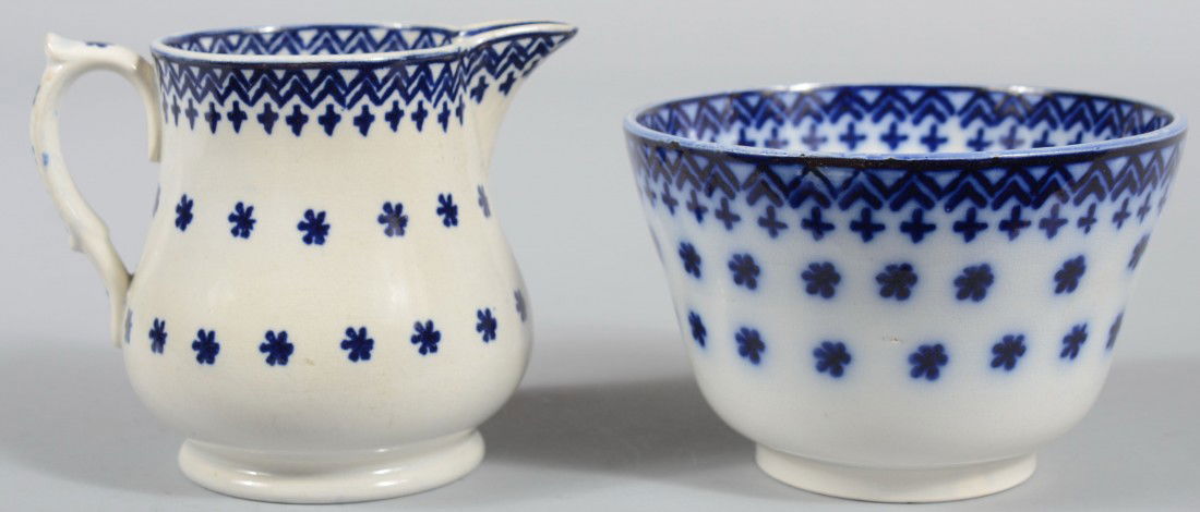 Flow Blue Transfer Ironstone China Snowflake Patte: Flow Blue Transfer Ironstone China Snowflake Pattern Cream Pitcher (4 1/8" high) and waste bowl (3 1/4" high). Condition: good.