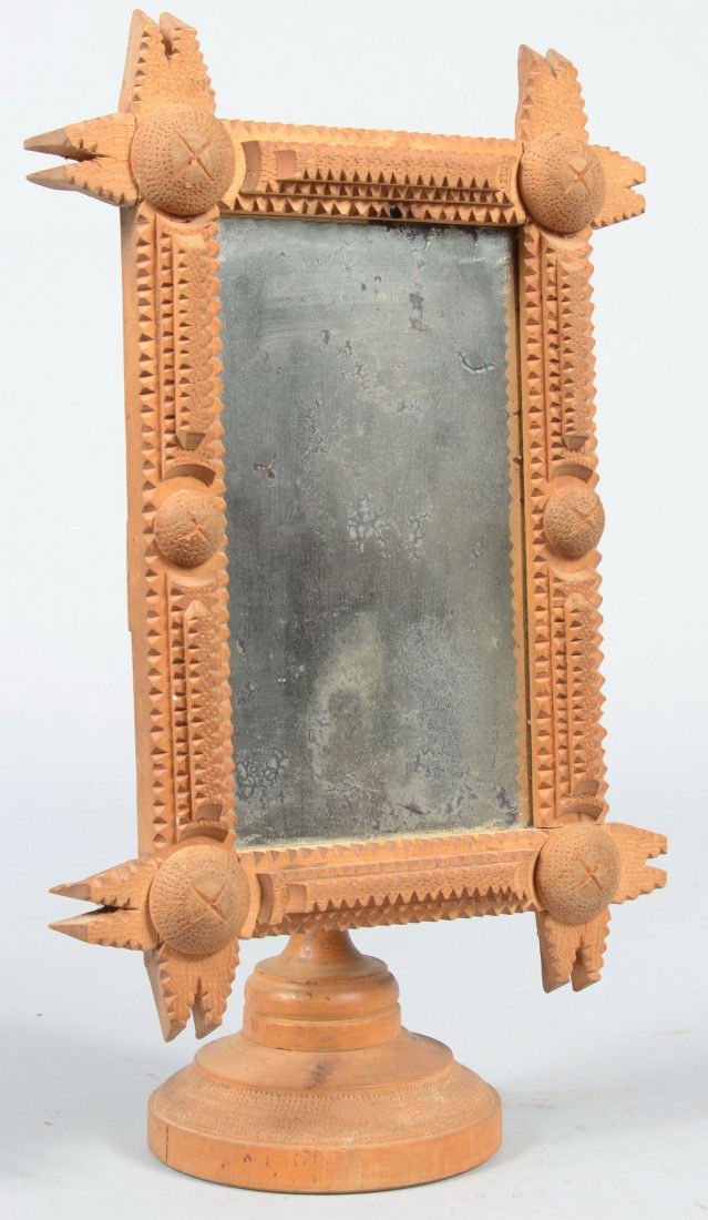 Tramp Art Adjustable Pedistal Mounted Vanity Mirro: Tramp Art Adjustable Pedistal Mounted Vanity Mirror. Chip carved lap jointed frame with two layer decorations and pin-punched and crossed round corner rosettes. 15"h. X 9"w. Condition: Good.