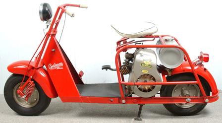 1950's Cushman Highlander Motor Scooter. Red pain: 1950's Cushman Highlander Motor Scooter. Red painted tubular steel frame with sheet metal fenders, cowl and floor. Single cylinder "Husky" motor with "Permalite" electrical system for lighting. (not c