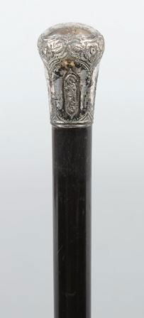 Straight Ebony Walking Stick with Embossed Silver: Straight Ebony Walking Stick with Embossed Silver Pommel Cap. Inscription on cap: "Presented to P. W. Humes by his Son, Will. Dec. 25 1872" Also has German silver tip. 35 1/2"l. Condition: Good.