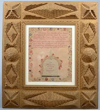 Gold Painted Tramp Art Picture Frame. Multiple la: Gold Painted Tramp Art Picture Frame. Multiple layers of chip carved wood on a flat frame surround a floral bound memorial needlepoint. Corner blocks of Maltese and Greek crosses. Unmarked. 20 7/8"h.