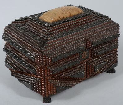 Tramp Art Sewing Box. Chip carved triangles and r: Tramp Art Sewing Box. Chip carved triangles and rectangles adorn sides and top in light and dark natural shellac finish, with monogrammed padded pin cushion framed on top of hinged lid. Black velvet l
