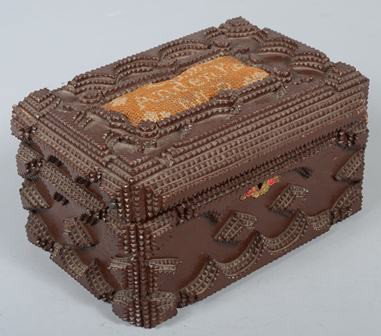 Chip Carved Sewing Box with Needlepoint Pin Cushi: Chip Carved Sewing Box with Needlepoint Pin Cushion on Lid. Brown painted box is decorated with multi-layered triangles, scallops, strips, diamonds, rosettes and quarter round corners. Box also has a