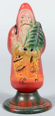 Painted and Molded Santa Claus Light Bulb in plas: Painted and Molded Santa Claus Light Bulb in plastic base. Standard base bulb and two color plastic socket base. Unmarked. 9"h. Condition: Paint flaking from back side and wiring missing from socket b