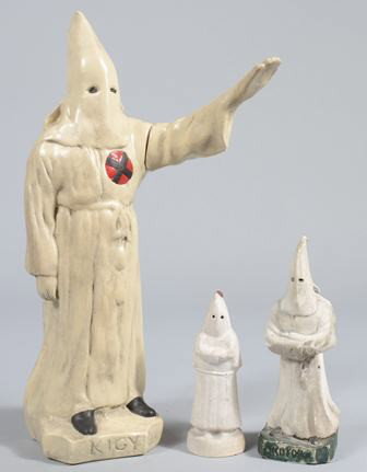 Three Vintage Plaster of Paris Ku Klux Klan Figur: Three Vintage Plaster of Paris Ku Klux Klan Figures; 16 1/2" high Figure marked "KIGY" with removable arm (voting device), 8" high figure marked "KOTOP." and a 6" figure, unmarked. Condition: good wit