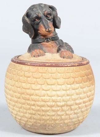 19th Century Caneware Tobacco Humidor with Dachsh: 19th Century Caneware Tobacco Humidor with Dachshund lid, impressed in base "JM Austria". 7 1/4" high. Condition: interior rim chip and minor wear.