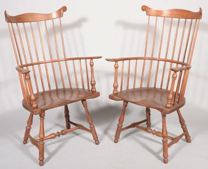 Pair of Contemporary Pennsylvania Style Comb Back: Pair of Contemporary Pennsylvania Style Comb Back Windsor Arm Chairs. Shaped crest rails with volutes and nine spindle back and six arm supports. Steam bent continues arm with carved paddle handholds 