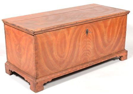 Early 19th Century Painted Softwood Blanket Chest: Early 19th Century Painted Softwood Blanket Chest. Mitered molded top mounted with fish-tail wrought iron hinges to a dovetailed case with molded top and dovetailed flat bracket feet. Yellow and red f