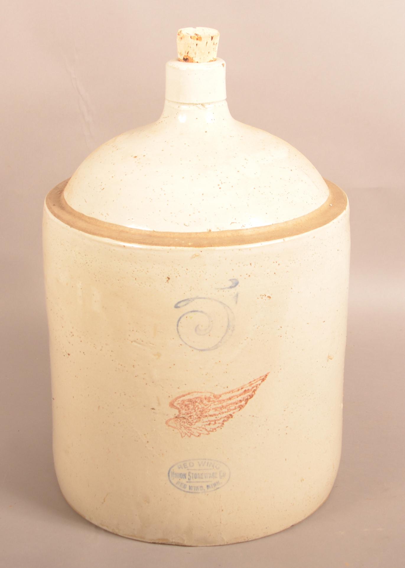 Red Wing Union Stoneware Co. 5-Gallon Jug.: Red Wing Union Stoneware Co. 5-Gallon Jug. 17-1/2"h. Condition: Good with minor wear.
