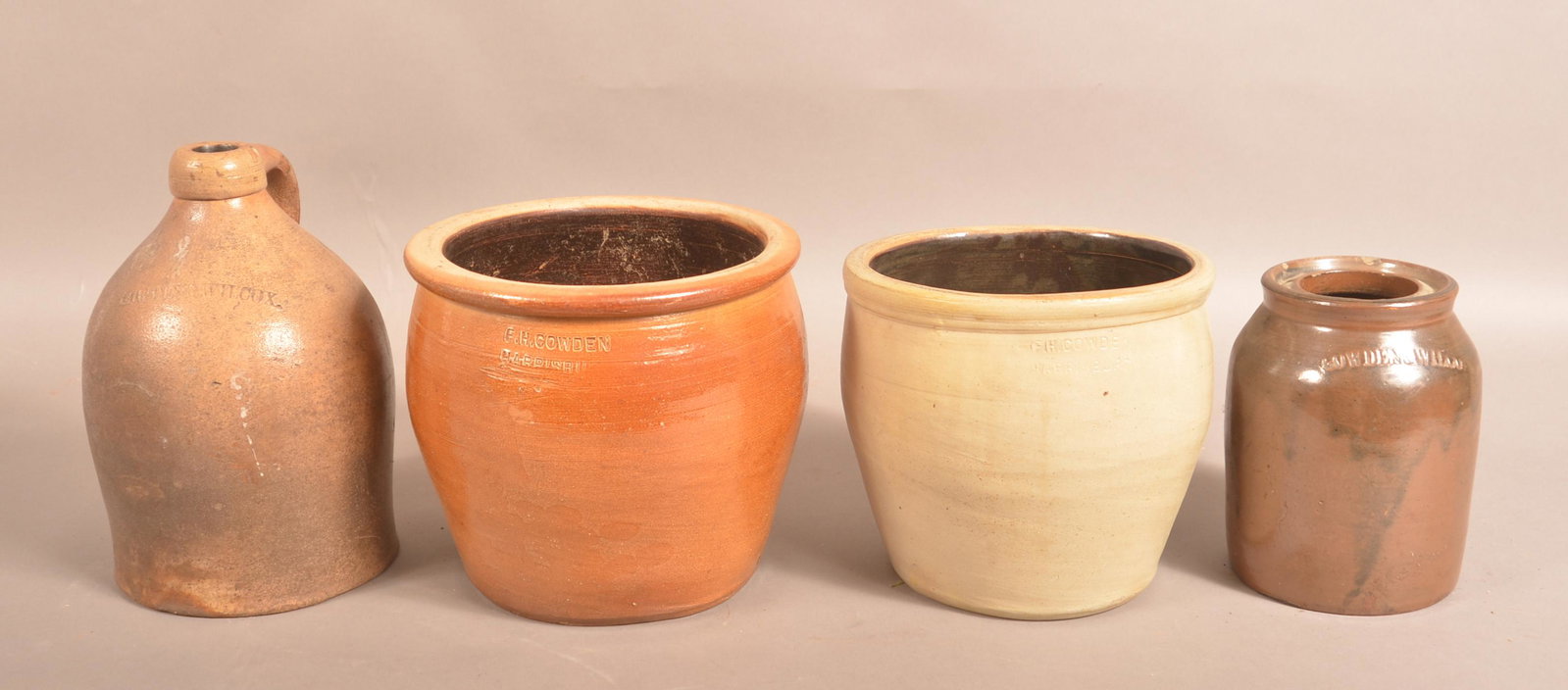 Four Antique Harrisburg, PA Stoneware Vessels.: Four Antique Harrisburg, PA Stoneware Vessels. Cowden & Wilcox jug, 9"h.; F.H. Cowden crock, 7-1/4"h.; F.H. Cowden apple butter crock, 6-3/4"h.; Cowden & Wilcox brown glazed canning jar, 6-1/2"h. Cond