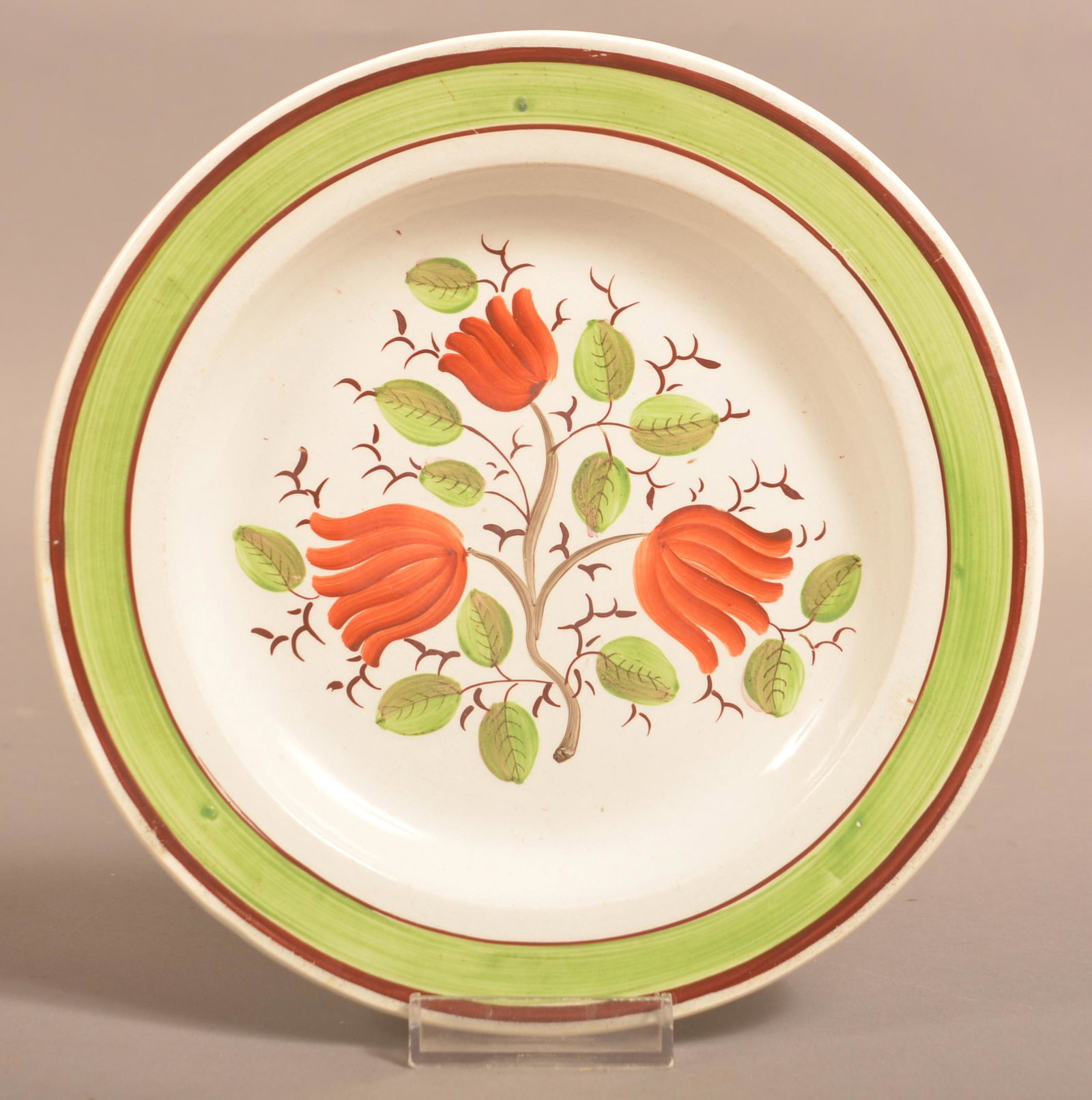 Hand-Painted Creamware Toddy Plate.: Hand-Painted Creamware Toddy Plate. Floral and foliate decoration. 7-1/2" diam. Condition: Good.