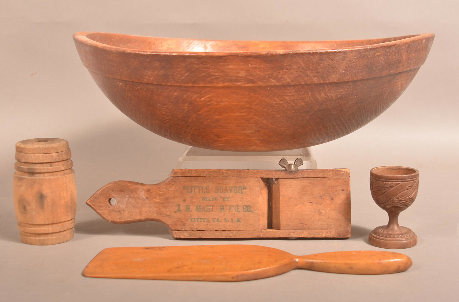 Lot of Antique Wooden Wares.: Lot of Antique Wooden Wares. Including 14-3/4" diam. Butter Bowl, Butter Paddle, Small Advertising "Little Shaver, Lititz, PA" ., Spice Canister and Carved Egg Cup. Condition: Good with use wear.