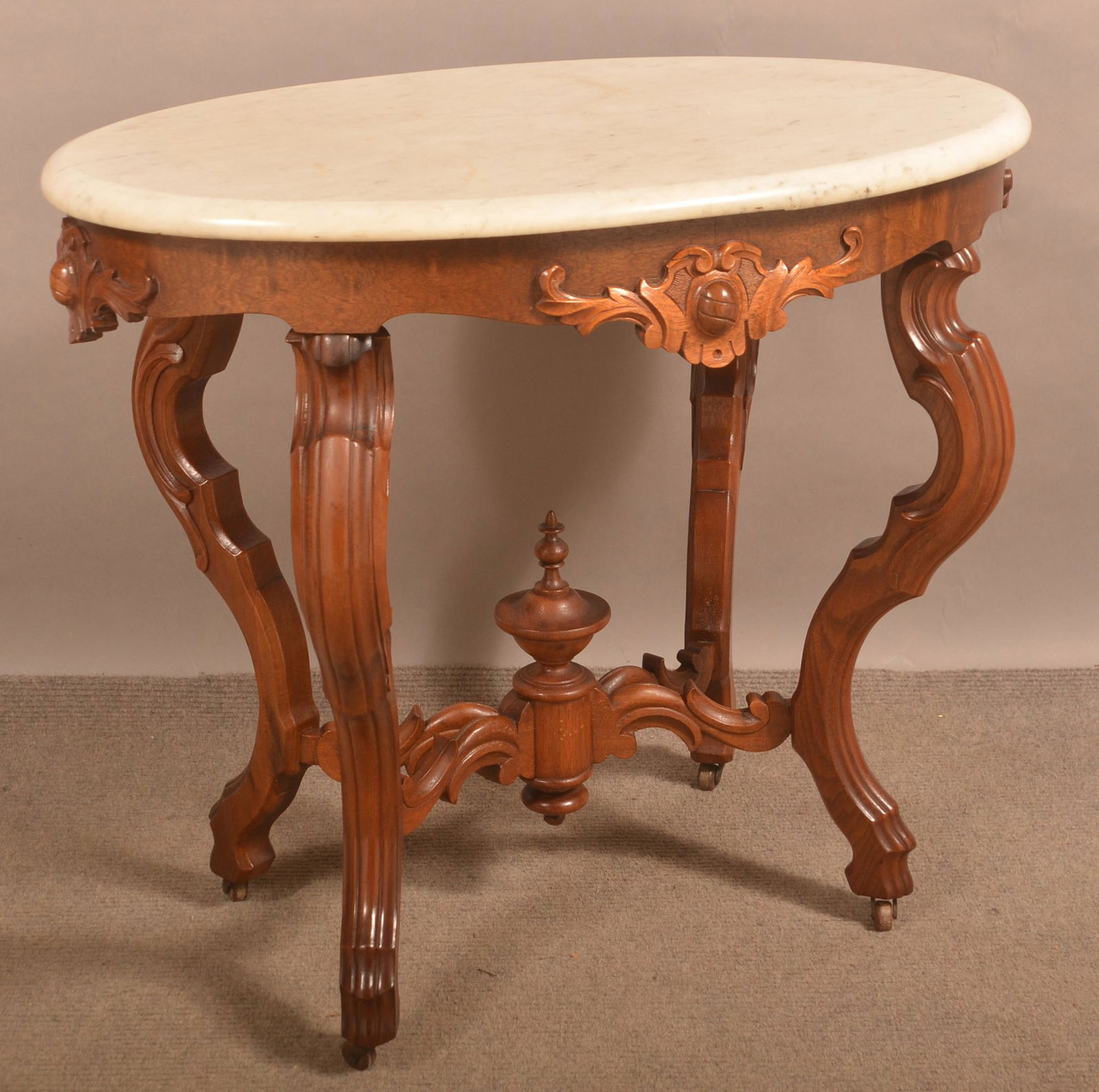 American Victorian Carved and Molded-Top Parlor Table. (1 of 2)