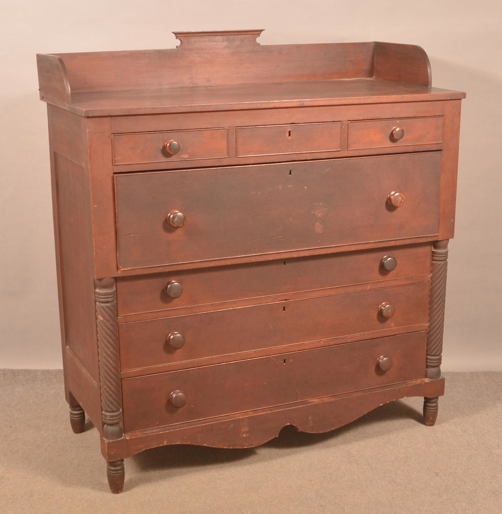 Empire Cherry and Mahogany Butler's Desk.: Empire Cherry and Mahogany Butler's Desk. 54"h. x 49"w. x 23-1/2"d. Condition: Good with wear.