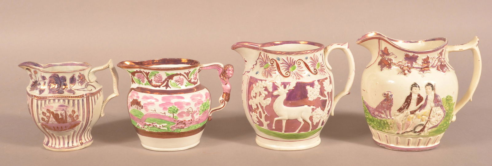 Four Various Staffordshire China Pink Lustre Pitchers. (1 of 5)