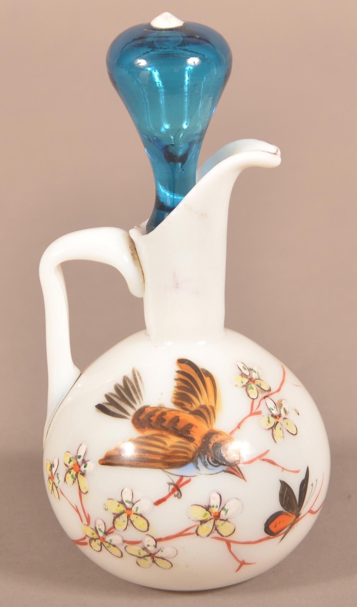 Webb Type Enamel Decorated Art Glass Cruet.: Webb Type Enamel Decorated Art Glass Cruet. Blown opaque glass with polychrome enamel bird and butterfly decoration. 7"h. including stopper. Condition: Very good.