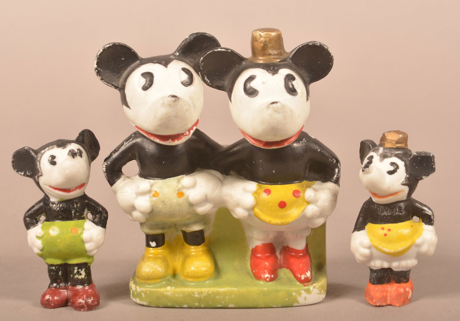 Vintage Bisque Mickey & Minnie Mouse Items.: Vintage Bisque Mickey & Minnie Mouse Items. Hand-painted made in Japan, circa 1930's. Tooth Brush Holder 4-1/2"h. and two figurines 2-3/4"h. Condition: good with wear.
