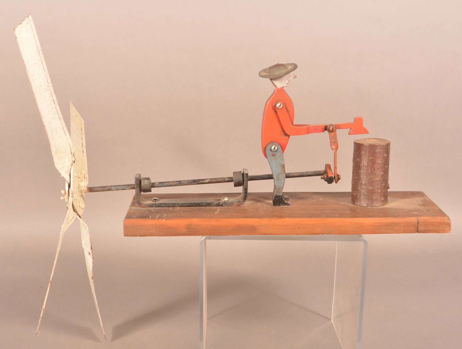 Vintage Lumberjack Whirligig.: Vintage Lumberjack Whirligig. Wood and metal construction. 22"l. Condition: Good.