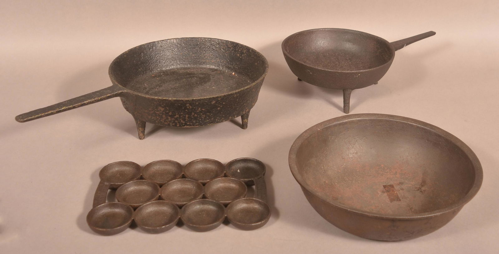 Four Antique Iron Kitchen Cookware Items. (1 of 3)