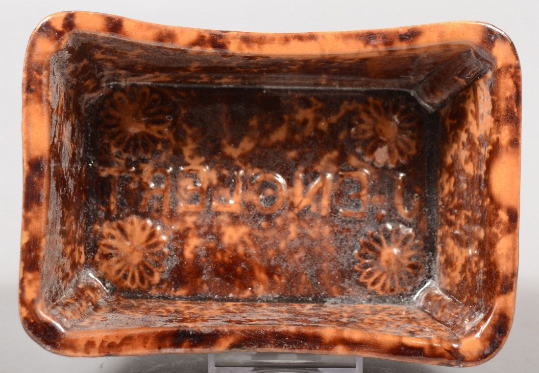 Rockingham Glazed Mold with Name. Interior bottom d: Rockingham Glazed Mold with Name. Interior bottom decorated with daisies in corners and "ENGLERT" in center. 2 3/8"h. X 6 1/8"l. X 4 1/4"w. Condition: Good.