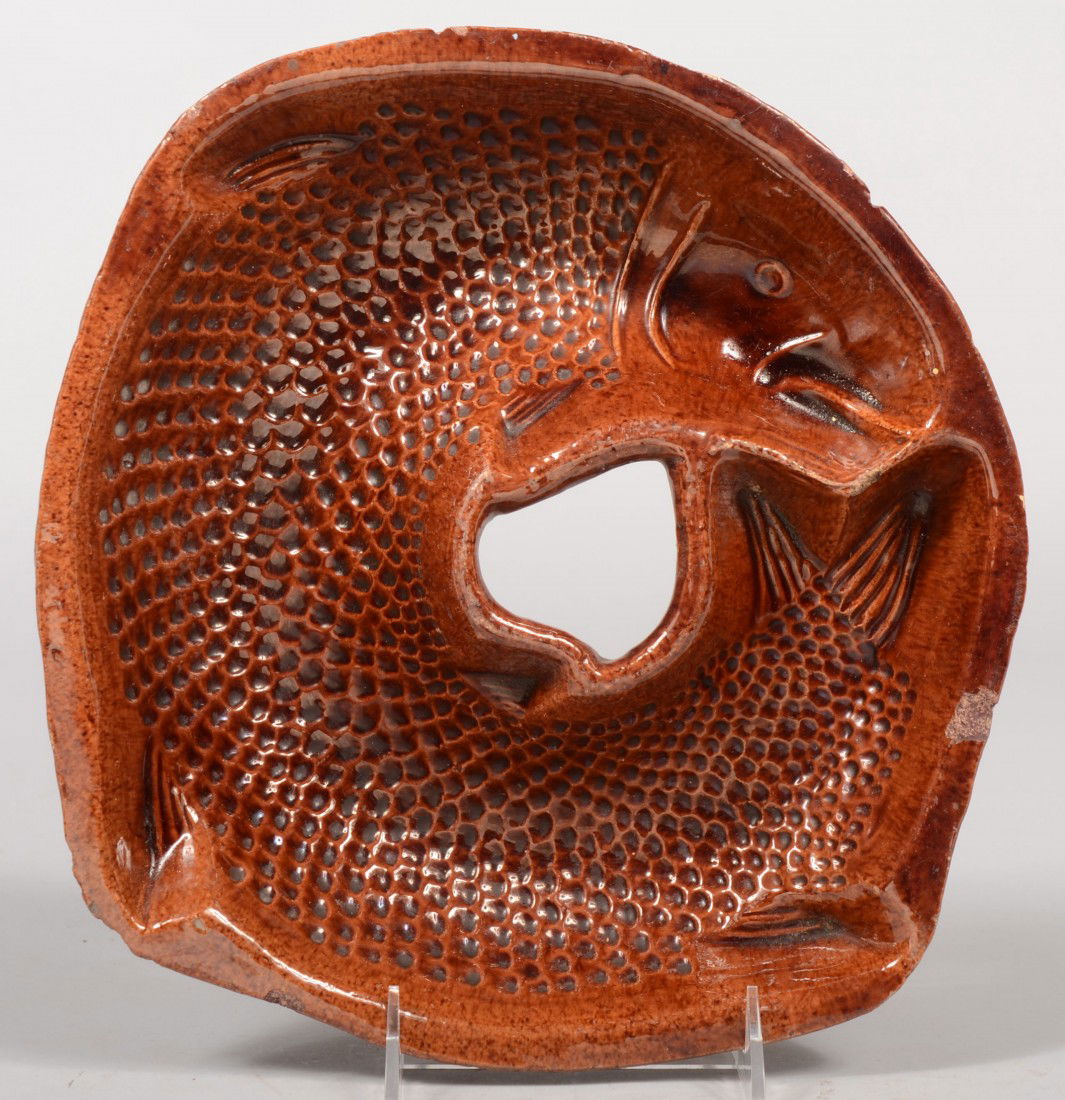 Brown Speckle Glaze Earthenware Fish Shaped Food Mo: Brown Speckle Glaze Earthenware Fish Shaped Food Mold. Unmarked. 11"dia. Condition: Several chips around rim edge. Larger chips off feet.