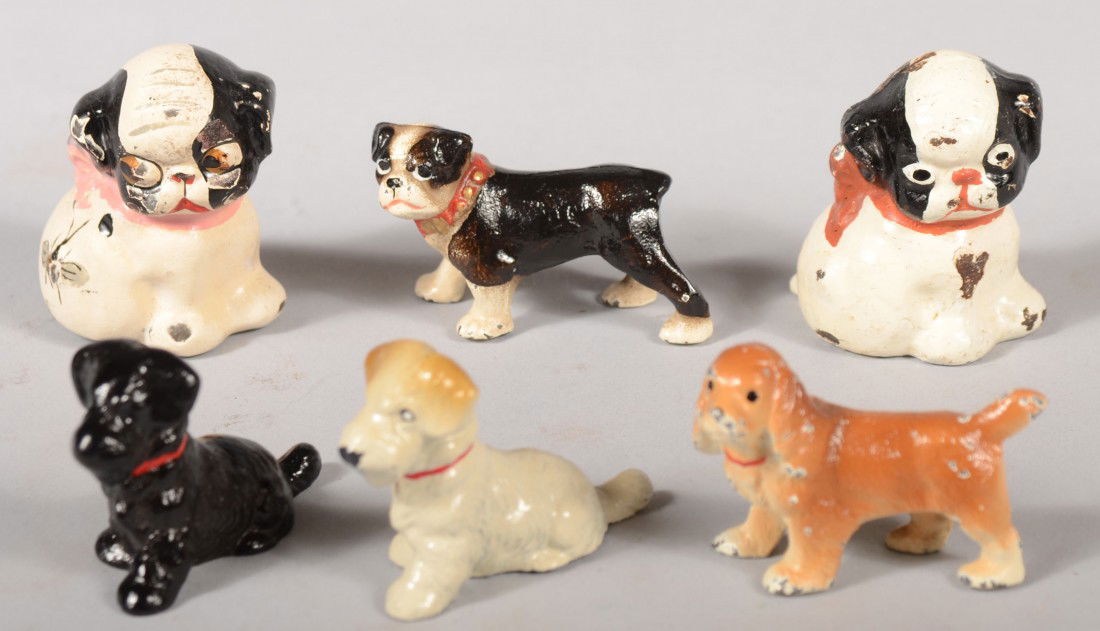 Six Hubley Miniature Dogs. Realistic painted cast: Six Hubley Miniature Dogs. Realistic painted cast iron including: 2 'Pupo's', Boston Terrier, Scotch Terrier, Spaniel. Largest: 1 3/4"h. Condition: Paint chips from use.
