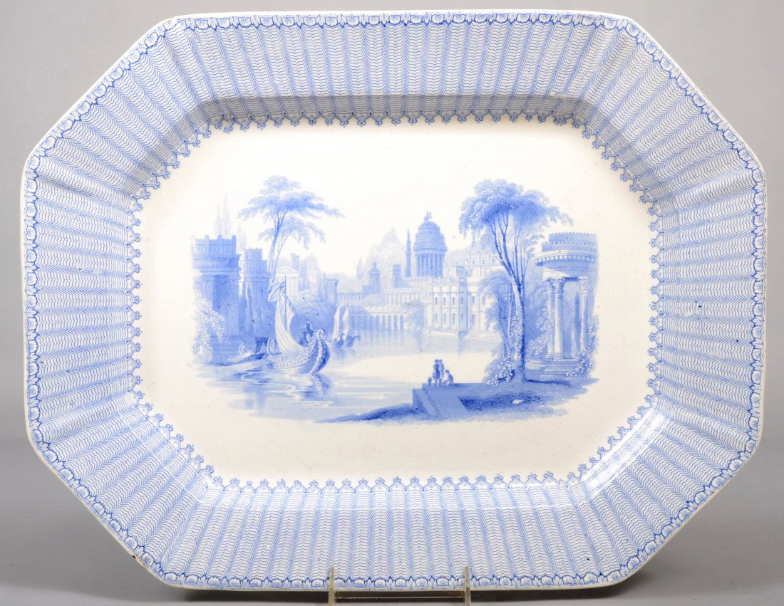 Large Octagonal Blue Transfer Ironstone Platter. D: Large Octagonal Blue Transfer Ironstone Platter. Design scene in center identified on back as 'Corinth'. Wide border with wavy line design and flower and leaf on rim. Marked on back: "G. Phillips, Lon