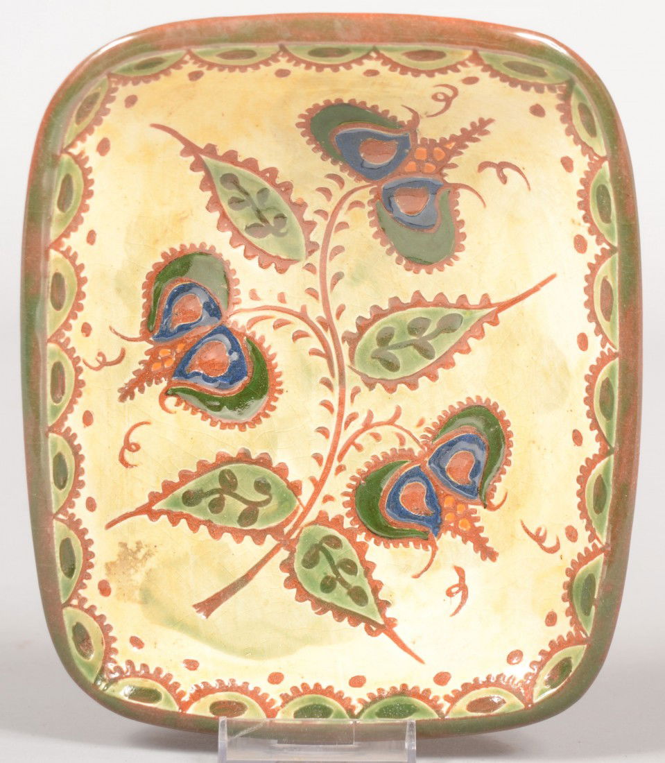 Contemporary Redware Loaf Dish. Rectangle dish has: Contemporary Redware Loaf Dish. Rectangle dish has pale yellow ground with incised decorations: Serrated edge scallops around rim and similar leaves with green slip and flowers with dark green, blue a