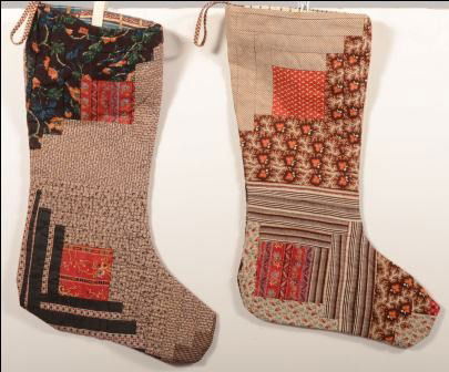 Pair of Contemporary Christmas Stockings. These ap: Pair of Contemporary Christmas Stockings. These appear to be made of an old shadow and light log cabin type quilt. Hand sewn. 17 1/2"l. Condition: Good.