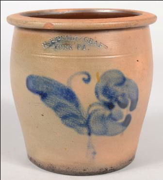 Pfaltzgraff Curved Sided Storage Crock. Cobalt flo: Pfaltzgraff Curved Sided Storage Crock. Cobalt floral decoration on face. Impressed under rim: "H. B. Pfaltzgraff, York, PA." 8 1/4"h. Condition: Three chips off upper rim.