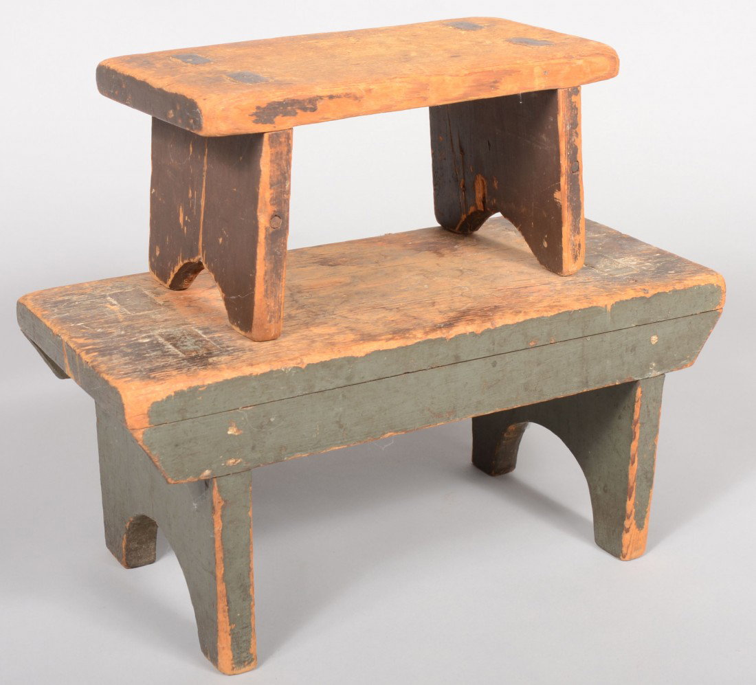 Two Painted Pine Foot Stools. Smaller stool has ha: Two Painted Pine Foot Stools. Smaller stool has half round leg cut-outs and brown paint. 6"h. X 12"l. Larger stool is gray green in color and has half round leg cut-outs. 8"h. X 17"l. Both tenon throu